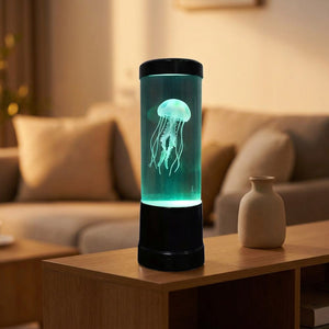 Lampe méduse USB allumée en vert d'eau sur une console de salon