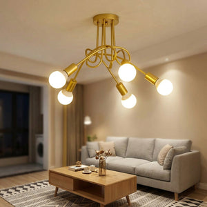 Lustre rétro doré 5 bras torsadés installé dans un salon moderne