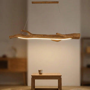 Lustre en résine imitant une branche avec seulement le ruban lumineux du dessous allumé