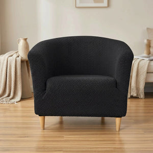 Housse de fauteuil club en jacquard texturé noir sur un fauteuil cabriolet