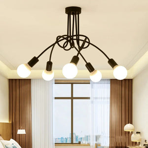 Lustre plafonnier rétro 5 bras noir mat dans une chambre adulte