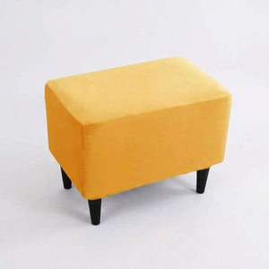 Housse de repose-pieds couleur Jaune posée sur un pouf