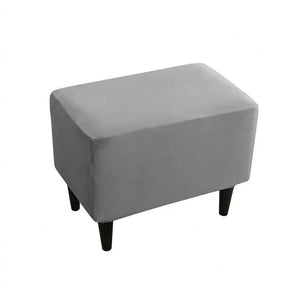 Housse de repose-pieds couleur Gris posée sur un pouf