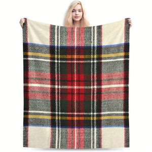 Un plaid tartan à motif écossais, avec un motif à carreaux.