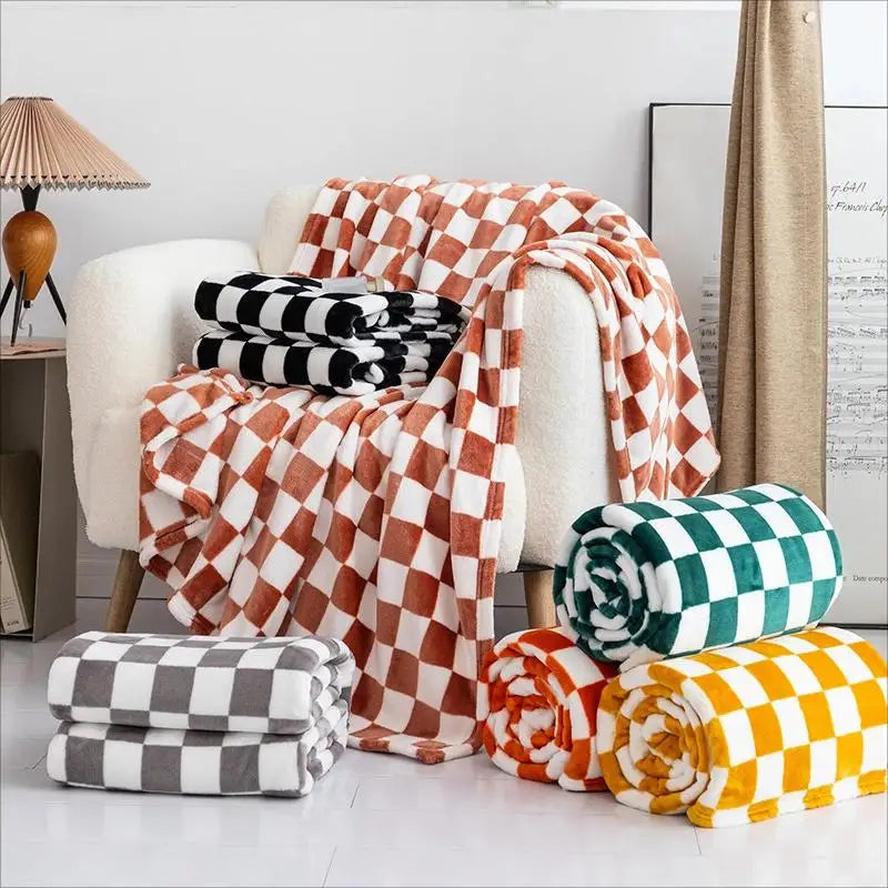 Plaid Canapé motif damier, vue en situation dans un intérieur chaleureux