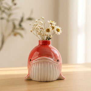 Vase baleine céramique rouge avec fleurs blanches séchées