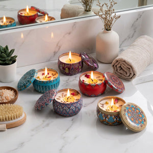 Bougies mandala allumées sur plan vasque marbre ambiance spa zen