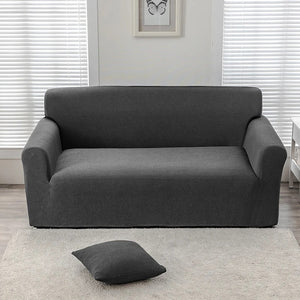 Housse de canapé en velours anthracite avec coussin assorti et tapis