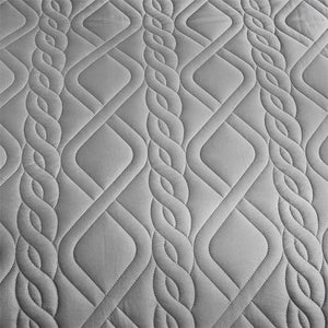 Gros plan sur le motif losange matelassé gris