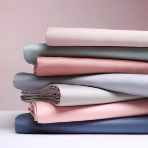 Photo AliExpress du drap plat blanc en coton égyptien posé sur un lit fait