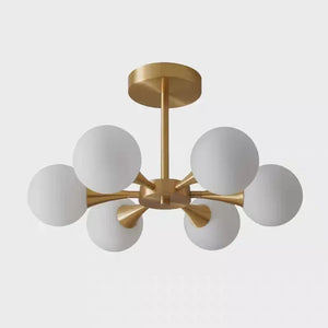 Lustre art déco 6 globes opalins en étoile sur fond neutre