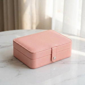 Boîte à bijoux compact cuir PU couleur rose