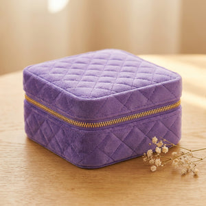 Boîte à bijoux de voyage en velours matelassé coloris violet