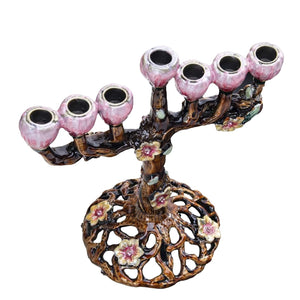 Bougeoir 7 branches zinc vu de dessus coupes tulipe ouvertes et base ajourée