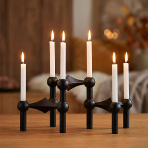 Bougeoir moléculaire noir lot de trois modules avec bougies allumées