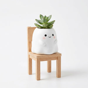 Cache-pot visage souriant modèle Chaise simple, personnage blanc sur chaise en bois