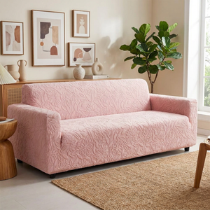 Housse de canapé rose en situation