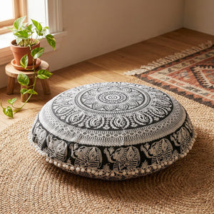 Coussin de sol rond motif éléphants noir et blanc avec pompons