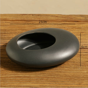 Dimensions du vase noir 23 x 6 cm