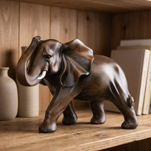 Sculpture d'éléphant version Droite en résine imitation bois sur étagère