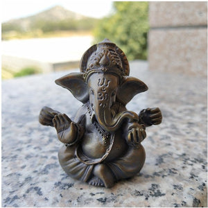 Figurine Ganesha bronze sur surface granitée décoration extérieure