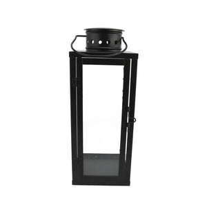 Lanterne à bougie en métal noir vue de face avec porte vitrée