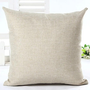 Housse de coussin en lin beige, vue produit sur fond neutre