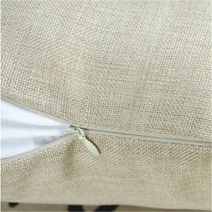 Détail du tissage en lin et de la fermeture éclair de la housse de coussin