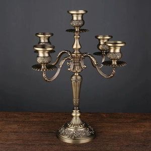 Chandelier baroque 5 bras métal bronze ciselé décoration table