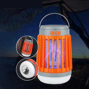 Lampe anti-moustiques UV orange en utilisation camping nocturne