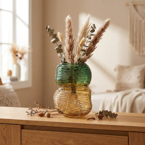 Vase sculptural en verre dégradé vert forme gourde avec branches séchées