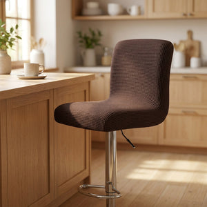 Housse de chaise de bar en jacquard texturé coloris marron sur un tabouret
