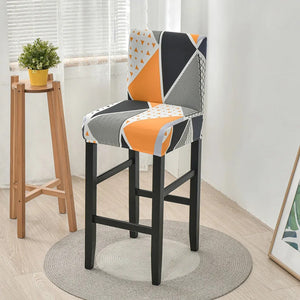 Housse de chaise de bar motif triangles orange contrastés vue du tissu extensible