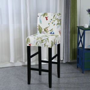 Housse de chaise de bar motif feuillage vert et oiseaux vue du tissu extensible