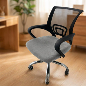 Gros plan sur la texture veloutée de la housse d'assise grise