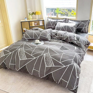 Housse de couette motif géométrique gris détail des taies assorties