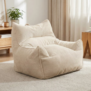 Fauteuil poire une place en coton gaufré beige dans un salon chaleureux