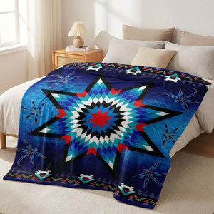 Couvre-lit amérindien à motif étoile bleu et turquoise déployé sur un lit