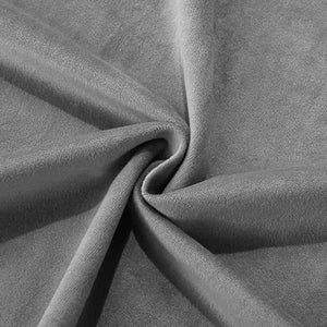Gros plan sur la texture douce et veloutee du tissu de la housse de coussin