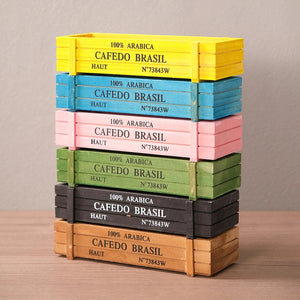 Jardinière en bois vintage déclinée en six coloris naturel jaune rose vert bleu et noir