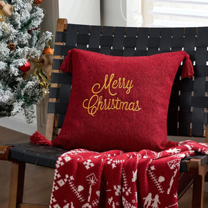 Housse de coussin rouge brodée Joyeux Noël doré sur plaid
