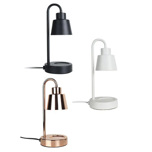 Lampe chauffe-bougie disponible en noir blanc et doré vue de face sur fond clair