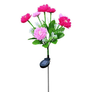 Lampe solaire a fleurs roses vue de face sur fond blanc