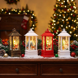 Lot de quatre lanternes de Noël LED assorties dans un décor festif