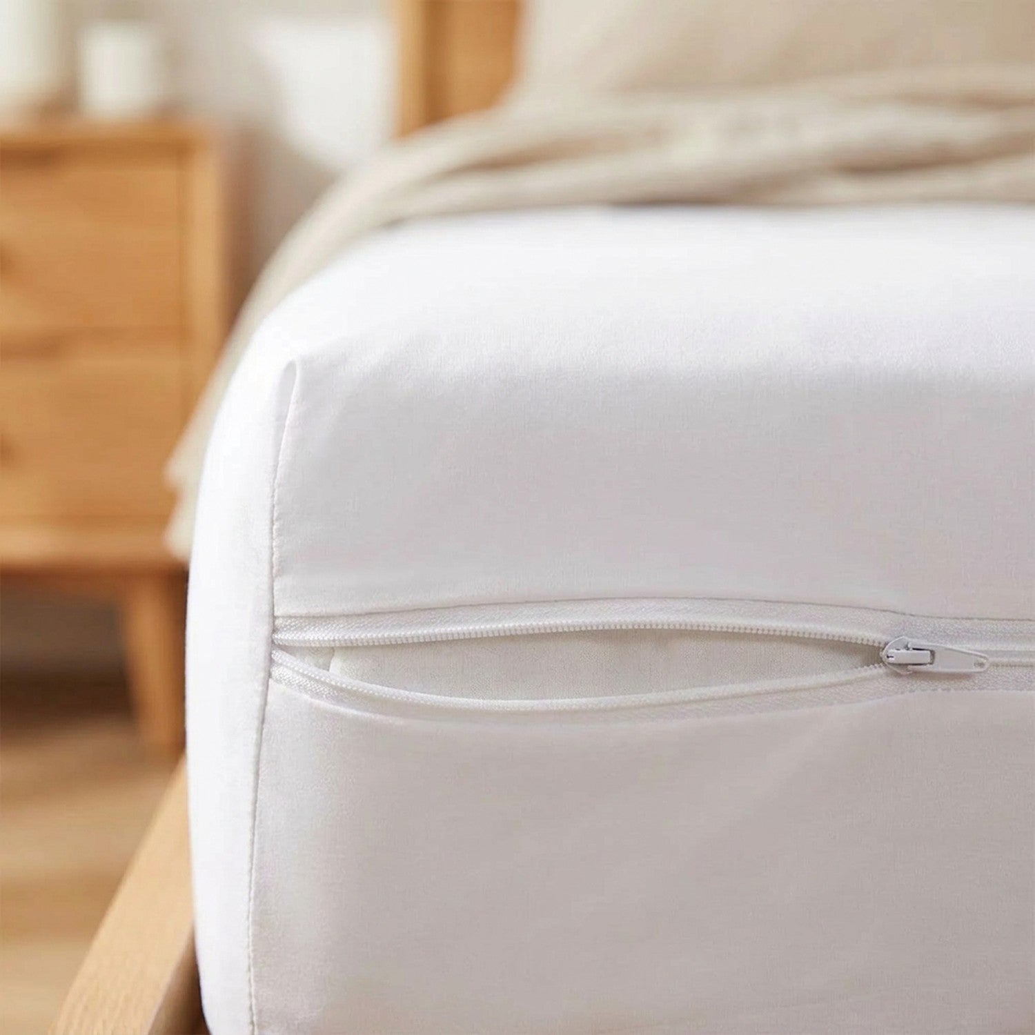 Gros plan sur le coin d'un matelas recouvert avec fermeture éclair discrète