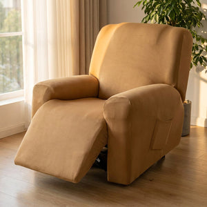 Housse de fauteuil relax beige près d'une fenêtre lumineuse avec une plante