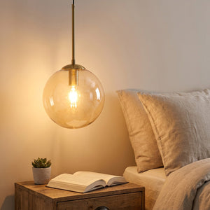 Suspension boule verre transparent chambre à coucher ambiance douce