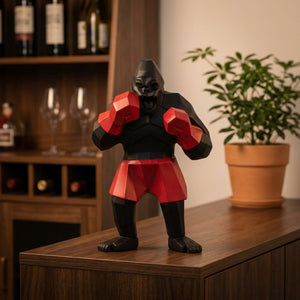Statue gorille boxeur noir près d'une armoire à vin