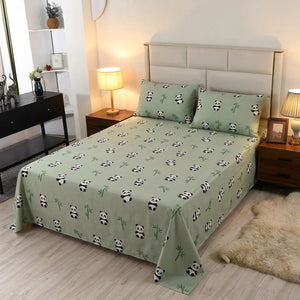 Drap plat en coton motif panda sur un lit dans une chambre moderne avec lampe de chevet