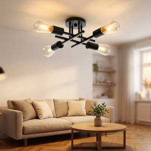 Lustre Sputnik 4 bras dans un salon moderne avec canapé